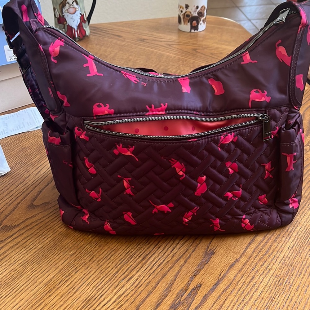 Lug camper SE bag in cats orchid pattern hardly used